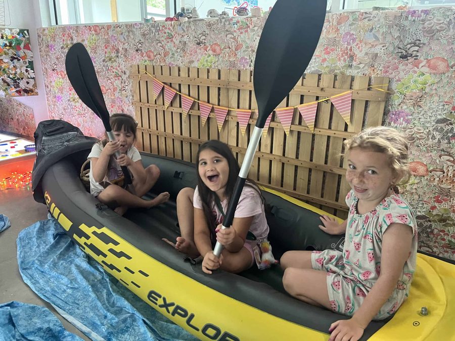 Selwyn students in a boat during a classroom activity